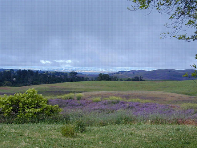 Sunlight on the valley through the clouds